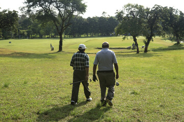 golfers on golf course