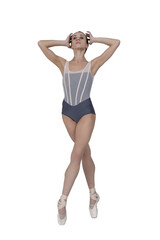 ballerina with beautiful feet poses in a photo studio, a ballerina in a leopard walks with her arms up