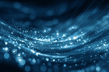 Bright luminous particles flow along wavy blue light trails in a dark digital space