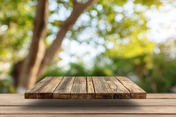 Rustic wooden platform appears elevated above a surface with a lush, out-of-focus green background