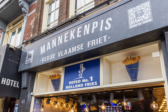 Amsterdam, Netherlands &ndash; April 16, 2025: Manneken Pis Holland Fries restaurant in the city center, showcasing a popular Dutch fast-food chain known for its traditional fries served to tourists .