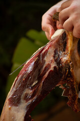 Close-up of a slice of Serrano ham expertly cut