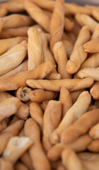 close up of a pile of breadsticks