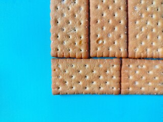 close up of cookies on blue background