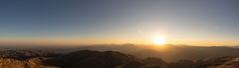 Panoramic view of the mountain range at sunset viewed from Mount Nemrut