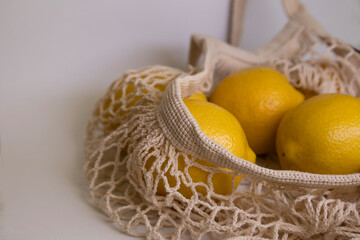 Trendy Lemon Flat Lay for Branding – Minimal Aesthetic with Mesh Bag