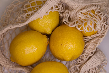Lemons in Mesh Bag – Clean White Mockup Background for Branding and Packaging Design