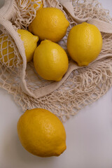 Lemons in Mesh Bag – Clean White Mockup Background for Branding and Packaging Design