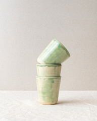 Handmade ceramic coffee and espresso cups made in the slip casting method of pottery