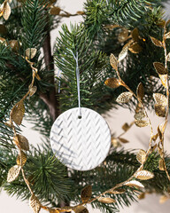 Handmade porcelain Christmas ornaments on a Christmas tree 