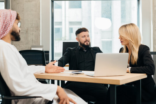 Diverse business team collaborating during office meeting