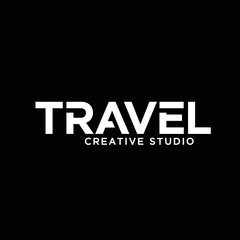 Fototapeta premium The logo features the word TRAVEL in bold white letters, with the words CREATIVE STUDIO below.