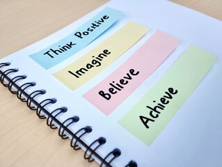 Hand written message on colorful sticky note as a self esteem building concept