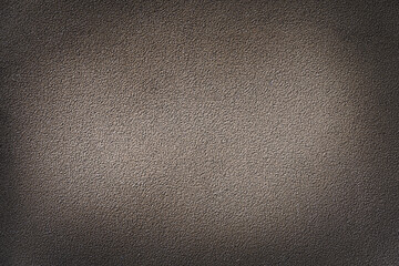 Dark abstract vignette texture with noticeable grain and clear surface details.