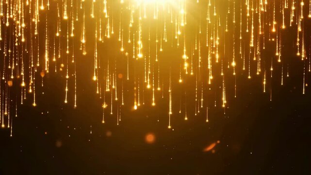 Elegant golden particle trails and glitter rain down from a bright spotlight, creating a shimmering curtain on a dark background