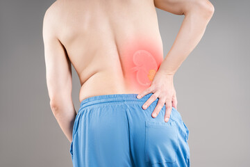 Back pain, kidney stones concept, inflammation and disease, renal discomfort
