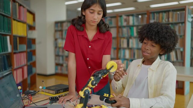 High school students learning and build electronic robot model together for construction project. Innovative technology, Development concept