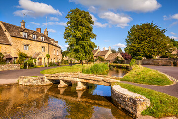 Lower Slaughter - The Cotswold village of Lower Slaughter on a beautiful bright summer day.