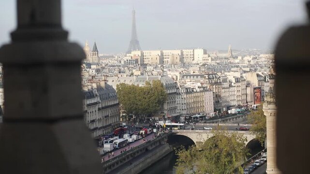Aerial view of Paris rooftops and Eiffel Tower with the Seine River