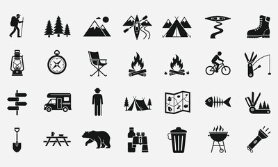 A comprehensive set of solid black glyph icons representing camping, hiking, and various outdoor adventure activities and equipment