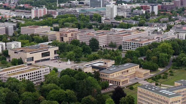 Aerial view of Westend Campus of Goethe University in Frankfurt am Main, showing modern academic buildings and lush green spaces