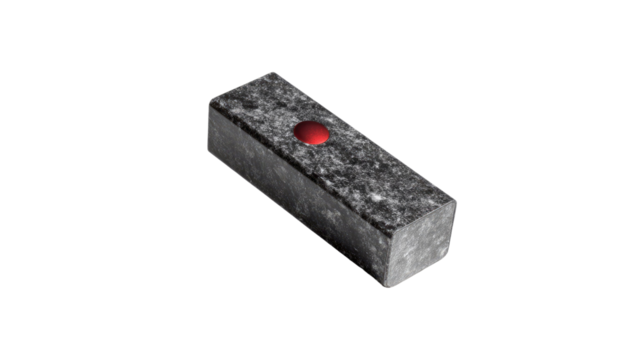 Rectangular gray stone block with red circular button minimalist industrial control object isolated on white background