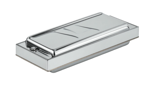 Chromatic harmonica with metallic finish on black background