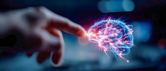 A hand reaching toward a glowing holographic brain, representing artificial intelligence, innovation, and deep learning