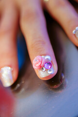 Elegant Nail Art with 3D Pink Rose, Pearls, and Rhinestones