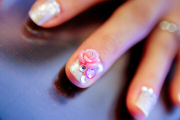 Elegant Nail Art with 3D Pink Rose, Pearls, and Rhinestones