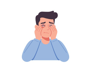 Young man with red irritated eyes and worried expression holding his face in distress and discomfort
