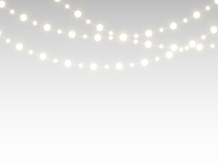 Decorative christmas string light with bright yellow glow.