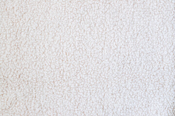 Soft cream sherpa fleece texture for winter clothing, blankets, upholstery, or background use in...