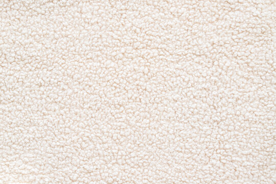 Soft cream sherpa fleece texture for winter clothing, blankets, upholstery, or background use in design projects