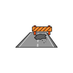 Road block with orange barrier and pothole indicating construction or repair work on a gray asphalt surface, suggesting caution and potential delays.