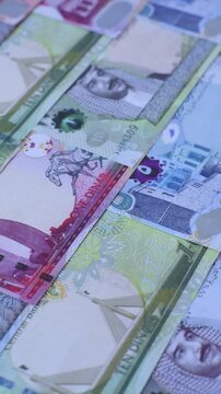 Bahrain paper money, dinar banknotes as currency for exchange or travel. Bahraini money as a business background