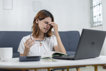 Tired women removing glasses and touching face, showing signs of eye strain or fatigue from screen time or studying. Perfect for content on work stress, burnout, education or digital lifestyle.