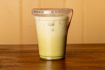 Iced matcha latte in a clear cup