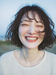 Natural portraits of a smiling woman in bright outdoor light and casual atmosphere