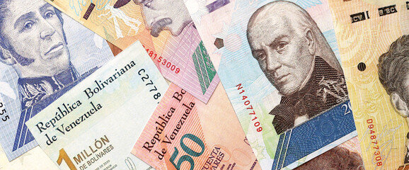 Venezuelan Bolivar currency money bills in big amount. Stack of VED currency banknotes with...