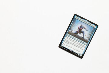 Obraz premium Bradford, UK Nov 3 2025 Spider-man 2099 Miguel O'Hara magic the gathering card shot isolated on a white paper background.
