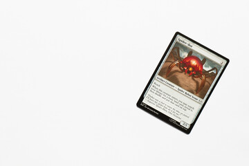 Obraz premium Bradford, UK Nov 3 2025 Spider-Bot Artifact Creature card from the Spider-man magic the gathering card game shot isolated on a white paper background.