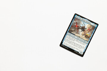 Obraz premium Bradford, UK Nov 3 2025 Doc Ock, Sinister Scientist card from Spider-man magic the gathering card shot isolated on a white paper background.