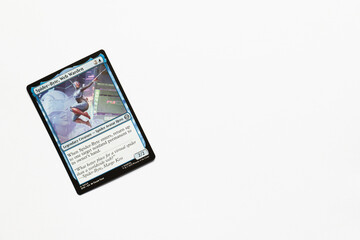 Naklejka premium Bradford, UK Nov 3 2025 Spider-Byte, Web Warden card from Spider-man magic the gathering card game shot isolated on a white paper background.