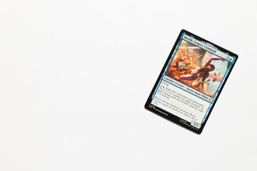 Naklejka premium Bradford, UK Nov 3 2025 Beetle, Legacy Criminal card from Spider-man magic the gathering card game shot isolated on a white paper background.