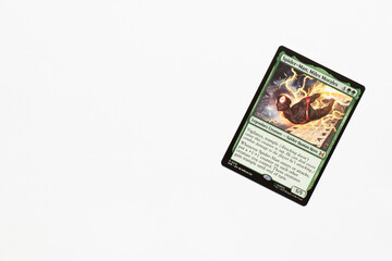 Naklejka premium Bradford, UK Nov 3 2025 Spider-man, Miles Morales card from the Spider-man magic the gathering card game shot isolated on a white paper background.