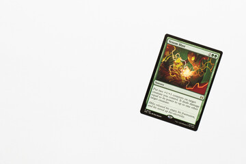 Naklejka premium Bradford, UK Nov 3 2025 Venom Blast card from Spider-man magic the gathering shot isolated on a white paper background.