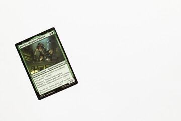 Naklejka premium Bradford, UK Nov 3 2025 Prowler Misguided Mentor card from Spider-man magic the gathering shot isolated on a white paper background.