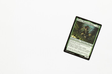 Naklejka premium Bradford, UK Nov 3 2025 Prowler Misguided Mentor card from Spider-man magic the gathering shot isolated on a white paper background.