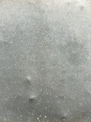 Galvanized Zinc Metal Surface with Grainy Texture and Dents